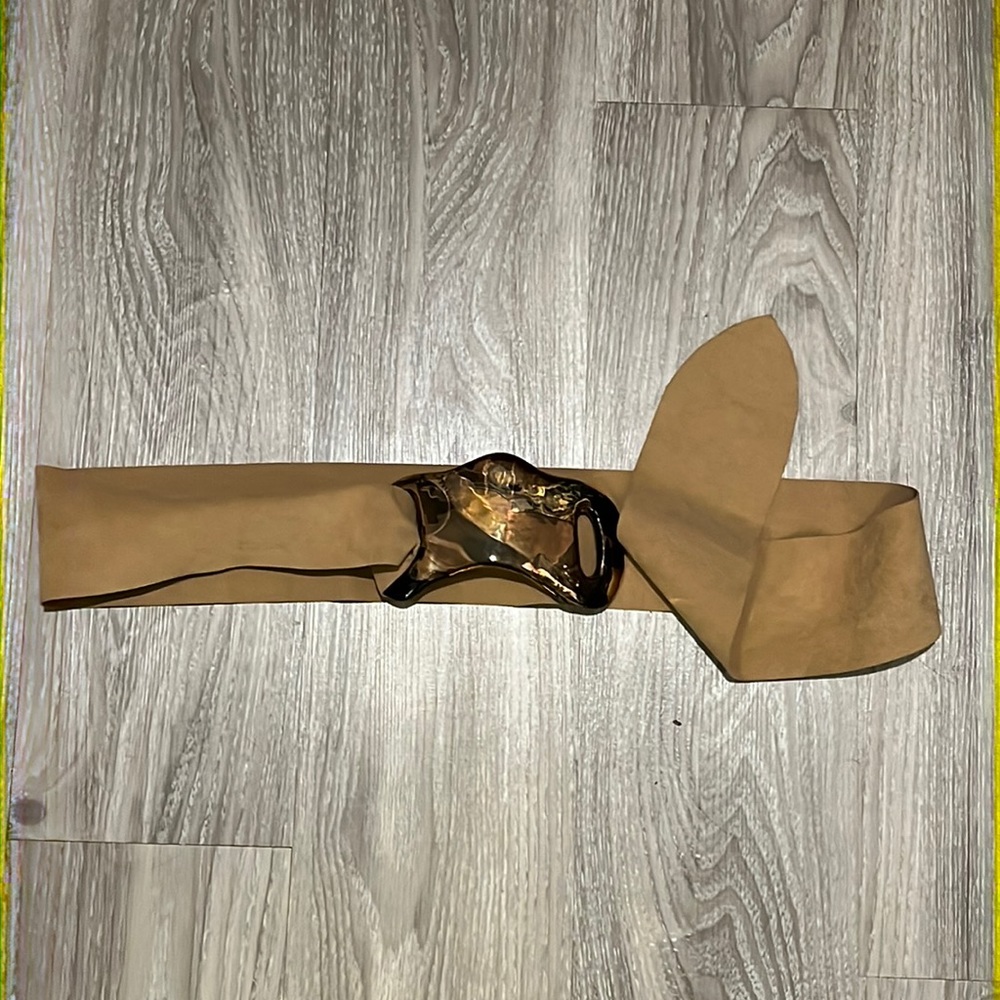 Super fun metallic belt buckle on suede like fabric